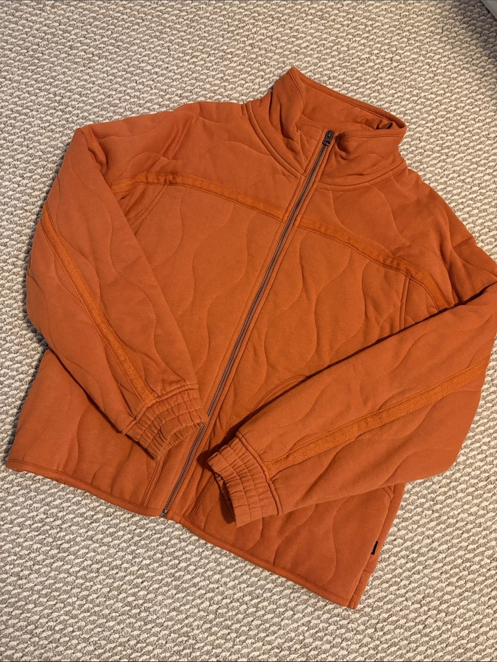 Burnt orange quilt like jacket